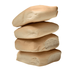A stack of four pieces of bread on top of each other.
